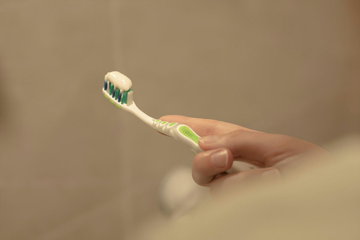 Your Toothbrush Sits in a Cloud of Toilet Aerosol. Here's What 2026 Research Confirmed